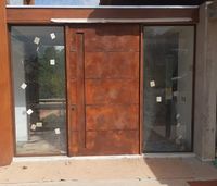 Casa do Corten - Porta pivotante em Aço Corten Whats