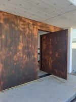 Casa do Corten - Porta pivotante em Aço Corten Whats