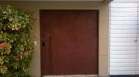 Casa do Corten - Porta pivotante em Aço Corten Whats